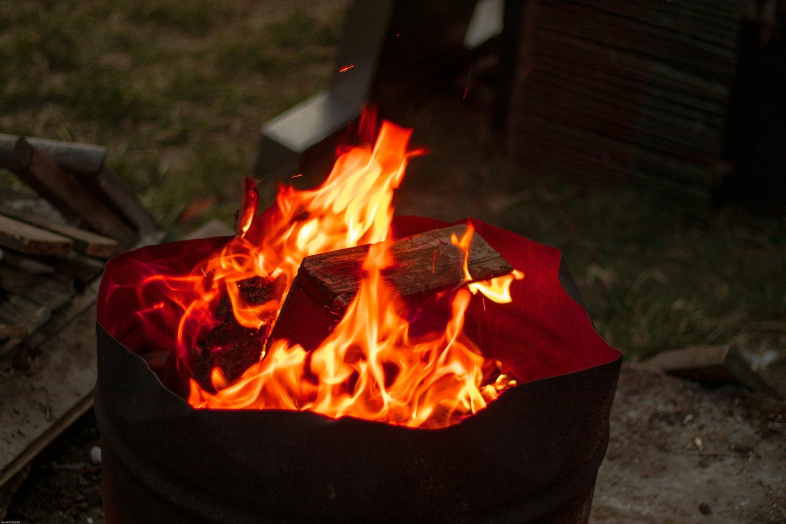 Wood burning in a metal barrel