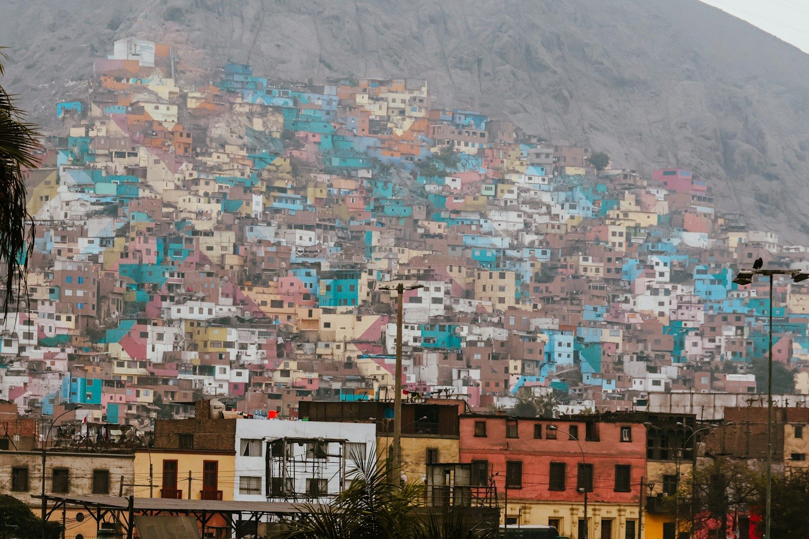 A city with a mountain in the background